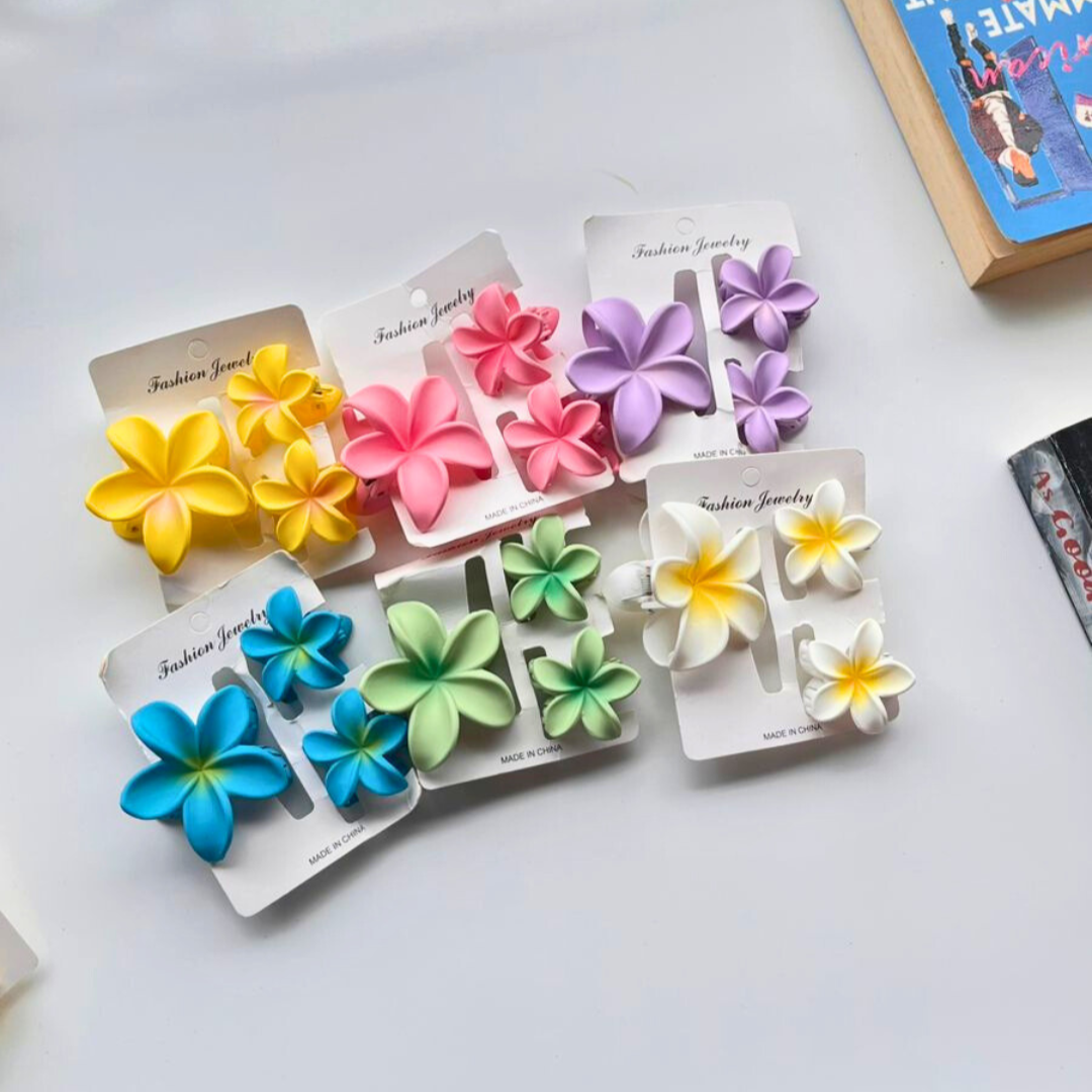 Colourful flower-shaped hair clips which are Pinterest coded and perfect for everyday wear.