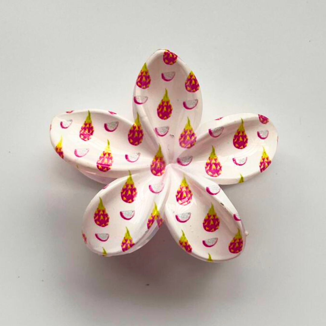Floral accessory with pink and yellow pattern on a white background