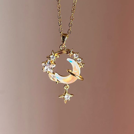 Gold necklace with a circular pendant on a gradient background