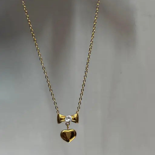 Golden Glimmer Bowheart Pendant